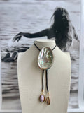 Abalone Shell Bolo with Black Braided Cord & Purple Cowrie Shell Tips