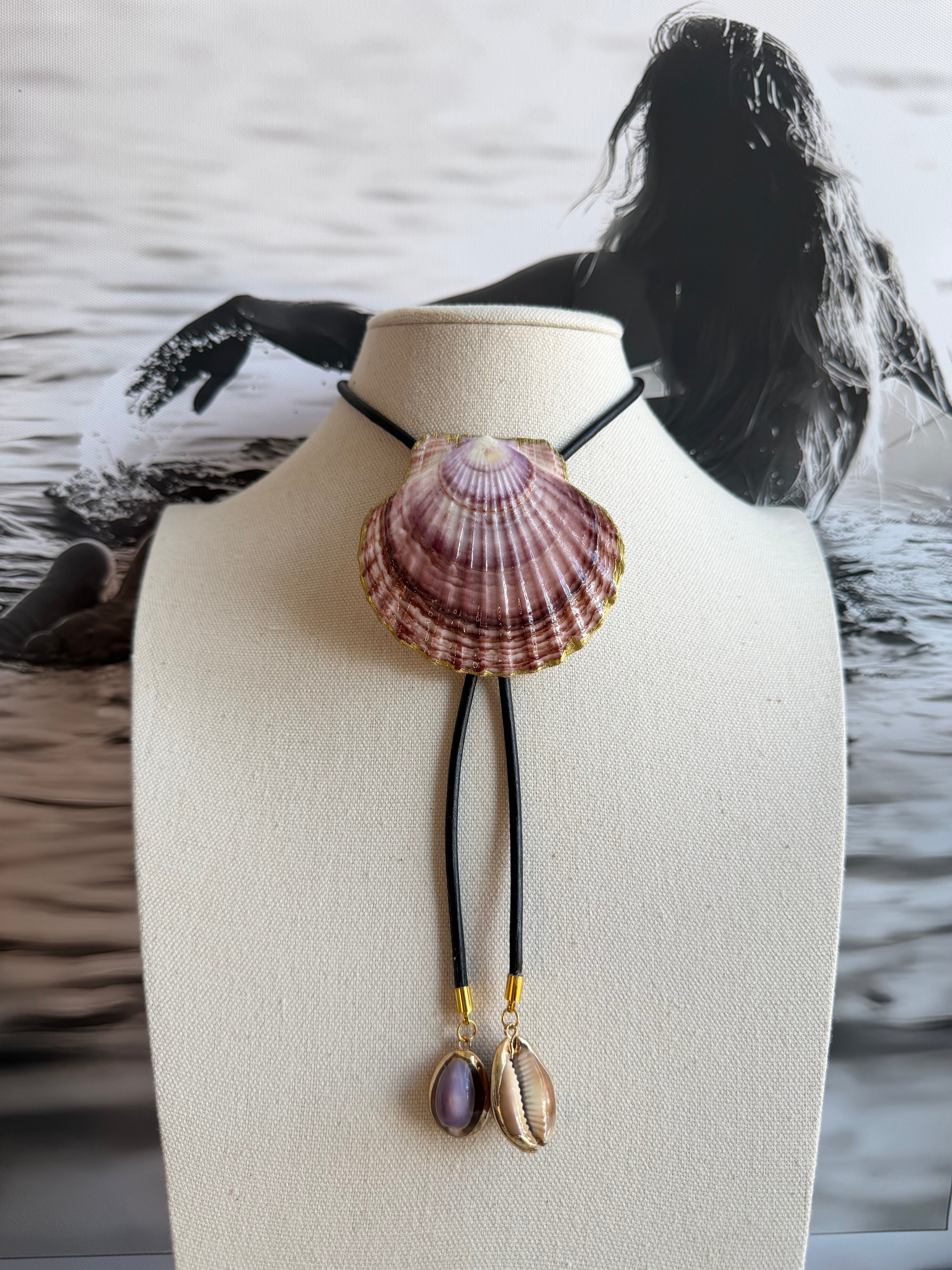 Purple Clam Shell Bolo Tie with Black Leather Cord and Cowrie Shell Tips